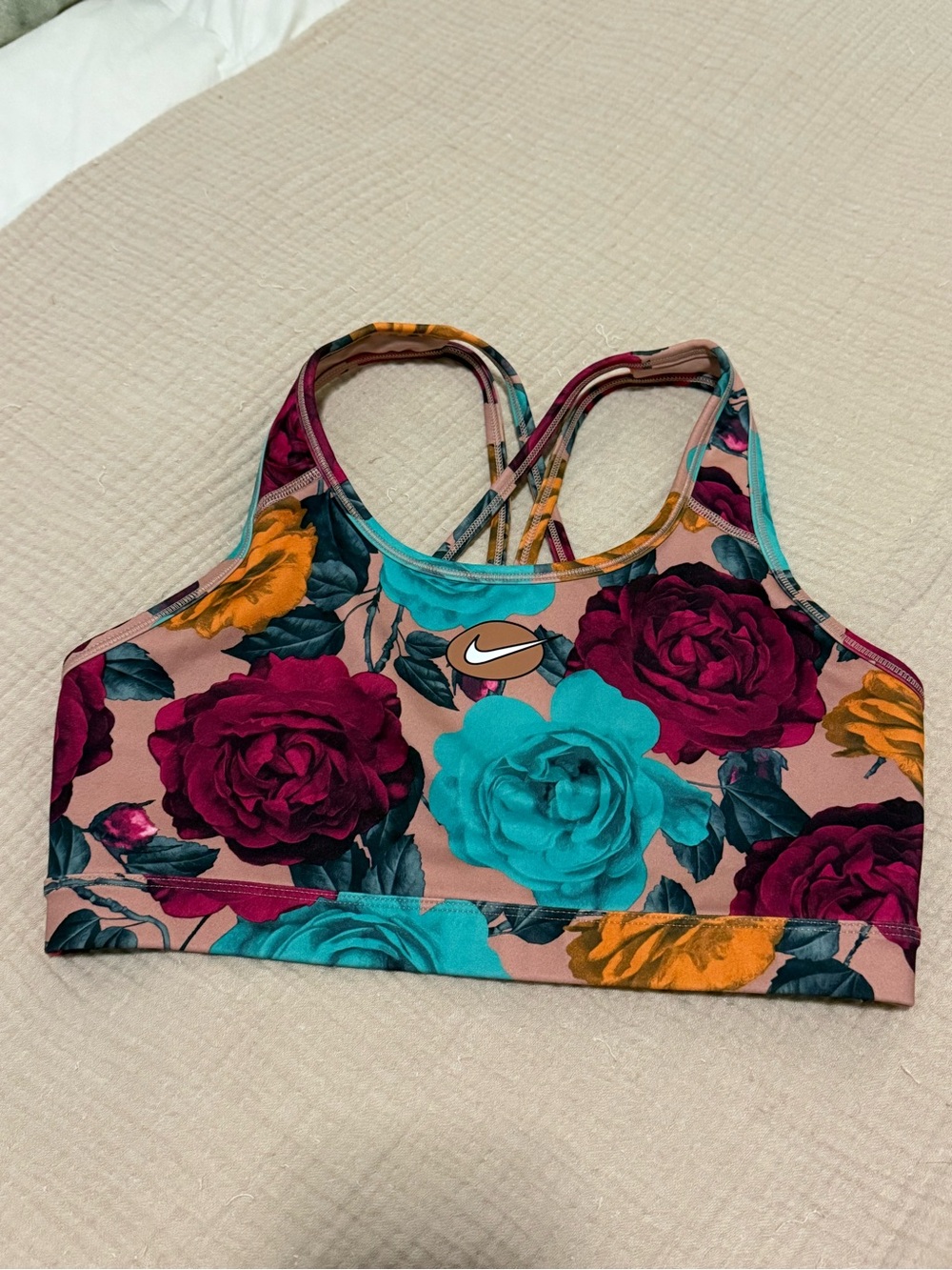 Nike Floral Crisscross Sports Bra - Teal, Magenta & Peach. Size Medium